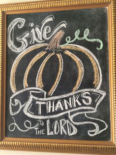 a chalkboard sign that says give me thanks to the lord