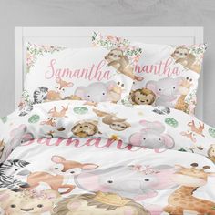 an animal themed bed with pink and white sheets