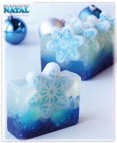 two blue and white soaps with snowflakes on them