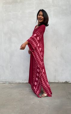 Indulge in the beauty of our classic kaftan with hand silk-screen printed fabric. This kaftan dress boasts unique patterns on high-quality rayon fabric. Its versatile design allows you to create many stylish looks, ensuring you always feel your best, whether you're at home or stepping out. Red Bohemian Kaftan With Ikat Print, Traditional Ikat Print Maxi Kaftan, Traditional Maxi Kaftan With Ikat Print, Traditional Printed Maxi Kimono, Traditional Printed Maxi Length Kimono, Traditional Maxi Length Printed Kimono, Traditional Printed Patterned Maxi Dress, Traditional Patterned Printed Maxi Dress, Flowy Red Printed Kaftan