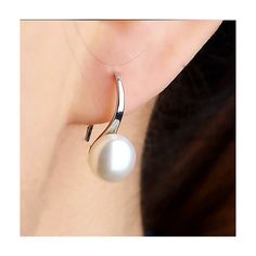 This delicate and understated style of earrings showcases a creamy white pearl bead attached to our signature silver IOBI Drill Hook. The classic and timeless look of pearls with a dash of silver. Customer verified as light and comfortable to wear all day every day! Gender: Female of any age Occasion: Special Occasions, Bridal, Birthdays, Perfect Holiday gift Materials: 14K White Gold plating over Alloy Size: 2cm long (.75 inch overall) Pearls: 10mm Resin pearl bead Comes gift boxed. Retail 49.95 Everyday Pearl White Earrings, Elegant White Everyday Earrings, Elegant White Everyday Jewelry, Elegant White Jewelry For Everyday, Elegant White Jewelry For Everyday Wear, Simple White Drop Earrings, Everyday White Pearl Pendant Earrings, Classic White Gold Pearl Charm Earrings, Elegant Sterling Silver Pearl Earrings Nickel Free