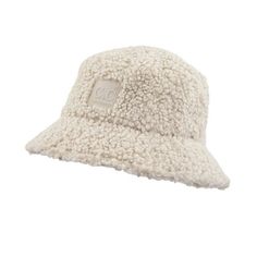 Stay warm and protected from the elements in the CC Sherpa Adjustable Bucket Hat. Its adjustable inner band ensures the perfect fit, while its stylish sherpa material and UVA/UVB sun protection keep you stylish and safe. Enjoy your outdoor activities in comfort and confidence with its lightweight, durable material and easy foldability for travel. Plus, it's distributed by a family-owned USA business and offers truly contagious support and customer service. CC authenticity and quality guaranteed! Sherpa Bucket Hat, Usa Business, Easy Travel, Floral Jumpsuit, Boutique Brands, Pet Hair, Stay Warm, Sun Protection, Outdoor Activities