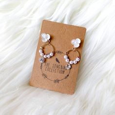 Rejoice Pearl & Flower Earrings are the most adorably dainty earrings that feature tiny flowers with an iridescent sheen and mini faux pearls. About 1.75 in long Pearl Flower Earrings, Pearl Flower, Tiny Flowers, Dainty Earrings, Flower Earrings, Faux Pearl, Notebook, Flowers