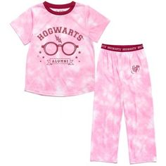 Hop on your broom and fly off to Hogwarts School of Witchcraft and Wizardry to enter the magical world of Harry Potter! Wearing this Harry Potter Pajama Shirt & Pajama Pants, approach the Sorting Hat to determine which House you will be in: brave Gryffindor, wise Ravenclaw, cunning Slytherin or kind Hufflepuff. Learn spells, potions, and general magic from professors like Severus Snape and Albus Dumbledore and go on adventures with Harry Potter and his friends Hermione Granger, Ron Weasley, Drac Harry Potter Pyjamas, Hogwarts Alumni, Girls Pajama, Harry Potter Kids, Sorting Hat, Cozy Pajamas, Albus Dumbledore, Hogwarts School, Severus Snape