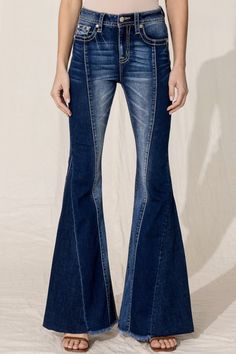 These deep denim super wide flares are an instant favorite! High rise dark wash flare detailed with whiskering, contrast stitching, multi shade wash and a 5 pocket with rhinestone rivets. 83% Cotton, 15.5% Polyester, 1.5% Elastane Machine wash inside out in cold water. Hang dry. Front Rise: 10.5" Back Rise: 14.5" Inseam: 34" Womens Western Hats, Womens Ball Caps, Womens Work Shirt, Mens Work Shirts, Super Flare Jeans, Mens Work Shoes, Dark Wash Flare Jeans, Western Store, Skirts With Boots