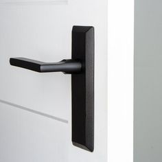 an open door with a black handle on it