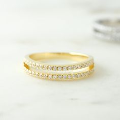 This is a beautiful double-band ring. Creates an effortlessly stacked look! Two rows of pave studded bands. Made of 925 Sterling Silver We use a THICK, DURABLE 14k Gold or Rhodium plating - for a piece that will last you years to come! Nickel-Free & Hypoallergenic Ring Width: 4mm Available in sizes 4-10 We use the highest grade cubic zirconia for an authentic diamond look! Simple Diamond Ring, Double Band Ring, Double Band Rings, Diamond Stacking Rings, Link Design, Wedding Jewellery Collection, Simple Ring, Band Engagement Ring, Engagement Bands