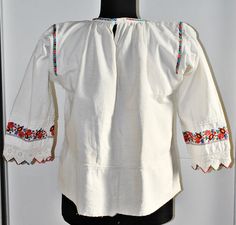 "This listing is for a beautiful woman's blouse from western Romania (Transylvania), a former region of Austro-Hungarian Empire. We found this piece in a remote Transylvanian highland village where the folk creations are preserved in their original forms, where peasant culture remains a strong force and medieval life prevails, as it does nowhere else in Europe . A Transylvanian folk costume gives the body a spiritual beauty. It is distinct from the costumes from other regions through its untold Romania Transylvania, Romanian Blouse, Highland Village, Medieval Life, Embroidered Linen, Folk Costume, Peasant Blouse, Romania, Hand Embroidered