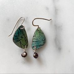 Artistic Earrings, Handmade In Kalamazoo Michigan. New, Never Worn. Comes In Gift Box. Unique Nickel-free Leaf-shaped Earrings, Metal Earrings With Artistic Design For Gifts, Green Earrings With Artistic Design For Gift, Green Dangle Earrings With Artistic Design, Green Hand Painted Sterling Silver Earrings, Artistic Green Earrings For Gift, Green Artistic Dangle Earrings, Handmade Everyday Leaf-shaped Jewelry, Artisan Earrings With Artistic Design For Gift