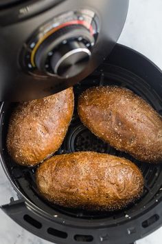 three loaves of bread in an air fryer