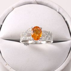 "Handmade Gemstone: Natural Citrine This ring features a 6x8 mm oval cut Natural Citrine and 925 sterling silver finished with rhodium. It is made by hand. Product Description Main stone: Natural Citrine Metal type: 925 sterling silver finished with rhodium Rhodium nickel free Made In : Jaipur Rajasthan Payment Policy------------------------------ we accept payment through PayPal only, Payment should be made within 3 days of purchase. .Delivery Time------------------ Item will be Shipped Within Halo Ring Engagement, Blue Aquamarine Ring, Green Tourmaline Ring, Rutilated Quartz Ring, Smoky Quartz Ring, Womens Ring, Ring Halo, Cushion Ring, Everyday Rings