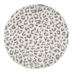 an animal print rug on a white background