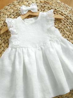 Gorgeous baby girl or toddler dress made of highest quality washed 100 % linen with ruffle lace. Perfect for your little one's baptism, flower girl, first birthday or other special occasion. Clothes made of linen has amazing properties: in the hottest time of the year - cools, in a cool - warms. It's natural, breathing and extremely cute looking! 🌿 Material: 100% linen, Oeko-Tex 100 certified. Lace : linen or cotton Colors: snow white, milk white, greyish sand 🌿 Please note. Each dress is uniq Summer Lace Dress With Ruffles For Wedding, Summer Garden Party Dress With Lace Bodice, Summer Wedding Dress With Lace Bodice, First Communion Lace Patchwork Dress For Spring, First Communion Spring Dress With Lace Patchwork, First Communion Spring Dress With Lace Trim, Spring First Communion Dress With Lace Patchwork, Bohemian Summer Dress With Lace Bodice, Summer Baptism Sleeveless Dress