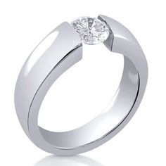 a white gold ring with a single diamond in the center, on a white background