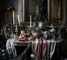 a table topped with lots of christmas decorations