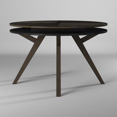 a round table with two wooden legs and a black top