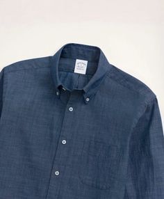 The Instagram-friendly Regent Chambray Sport Shirt. Stylish yet comfortable enough for all your posts with its incredibly soft 100% cotton chambray, classic button-down collar and chest pocket. Fit for everyday wear with its regular tailored cut that flatters any body type. Pair it with jeans, shorts or khakis alike - this wardrobe essential is perfect for all your adventures, both on and offline. Relaxed Fit Chambray Shirt With Button Closure, Classic Button-up Shirt For Everyday, Classic Shirt With Spread Collar And Buttoned Pockets, Classic Everyday Slim Fit Shirt, Classic Slim Fit Tops With Pockets, Solid Cotton Shirt With Buttoned Pockets, Relaxed Fit Chambray Shirt For Casual Gatherings, Unstructured Chambray Tops For Everyday, Fall Chambray Button-up Shirt