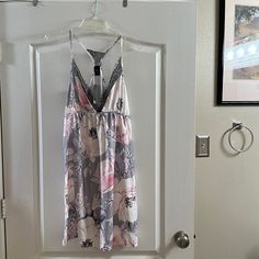 Black Lace, White Pink And Gray Spring Nightgown With Built-in Bra, Sleeveless Beach Nightgown With Built-in Bra, Spring V-neck Sleepwear With Built-in Bra, Sleepwear With Built-in Bra For Vacation, Pink Camisole Nightgown For Bedtime, Sleeveless Lace Trim Nightgown For Vacation, Floral Print Camisole Sleepwear For Loungewear, Feminine V-neck Sleepwear For Sleepover, Vacation Sleepwear With Spaghetti Straps And Built-in Bra