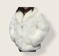 STUNNING UNISEX WHITE BABY ALPACA FUR COAT Styled and glamorous Baby Alpaca fur coat handmade of 100% genuine baby alpaca fur. Value for money is what every buyer seeks to achieve when buying any item. In the recent past, fur coats have gained popularity, and everyone wants to have as many of these as they can afford. Indeed, the coats are luxurious and investment because of many reasons. Size available : XS - S - M - L - XL - XXL Material: 100% baby Alpaca fur. Garment Type: fur coat Washing In Fluffy Winter White Fur Coat For Winter, Winter White Fluffy Fur Coat For Winter, White Fluffy Elegant Fur Coat, Elegant White Fluffy Fur Coat, Winter White Faux Fur Coat For Cold Weather, White Fur Coat With Faux Fur Lining For Winter, White Fur Coat For Winter, White Faux Fur Lined Coat For Winter, White Faux Fur Lined Coat For Cold Weather