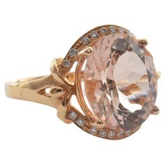 This collection features an array of magnificent morganites! Accented with Diamond these rings are made in rose gold and present a classic yet elegant look. Classic morganite ring in 18K Rose gold with Diamond. Morganite: 4.29 carat, 12X10mm size, oval shape. Diamond: 0.118 carat, 1.10mm size, round shape, G color, VS clarity. Gold: 3.50g, 18K Rose Gold. R714 Luxury Morganite Diamond Ring With Prong Setting, Luxury Pink Gold Morganite Jewelry, Luxury Morganite Diamond Ring With Accents, Luxury Morganite Diamond Ring With Diamond Accents, Luxury Morganite Diamond Ring For Anniversary, Formal Morganite Diamond Ring In Fine Jewelry Style, Formal Morganite Diamond Ring Fine Jewelry, Formal Morganite Diamond Ring, Formal Rose Gold Morganite Diamond Ring