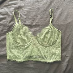 Never Worn As It Still Has A Tag On The Bra Strap Color Is More Light Mint Green As You Can See In Last Photo Size 36c Cute Going Out Top Just Need To Add Covers As It Is A Little See Through Also Have Another In Black!! Victoria's Secret Lace Camisole Top, Victoria's Secret Underwire Bra-friendly Tops, Victoria's Secret Lace Tops Bra Friendly, Victoria's Secret Fitted Lace Camisole, Fitted Lace Camisole By Victoria's Secret, Green Corset, Green Bras, Light Mint Green, Bra Strap