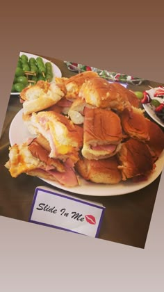 a pile of food sitting on top of a white plate