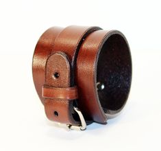 Unique brown leather bracelet! Very comfortable & easy to wear. Size: Wirst size: 6-8.5 inches(16-22cm) Width: 1.9 inch (5 cm) Color: brown. Material: genuine leather(leather is produced in Italy). If you have any questions please write! Brown Cuff Bracelet With Waxed Finish As Gift, Brown Waxed Finish Cuff Bracelet As Gift, Brown Waxed Finish Cuff Bracelet For Gift, Brown Cuff Bracelet With Waxed Finish For Gift, Gift Cuff Bracelet With Waxed Finish, Waxed Finish Leather Cuff Bracelet As Gift, Classic Leather Strap Cuff Bracelet Gift, Leather Cuff Wristband Gift, Leather Strap Cuff Bracelet Gift