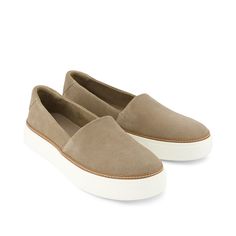 Where simplicity and style meet. With beige suede uppers and a white platform sole, the Kameron slip-on is the perfect companion for errands or play dates with the kids. CloudBound™ insoles provide comfort on days you need it most. Suede uppers. TOMS leather products support responsible manufacturing via the Leather Working Group. Rubber outsole. Removable Custom CloudBound™ foam insoles for all-day comfort and support. Hidden elastic gore for easy fit. Outsole height is approximately 1". TOMS i Womens Fall Slip On Shoes, Casual Work Tennis Shoes, Womens Slip On Shoes Casual, Cute Work Shoes For Women, Best Slip On Shoes For Women, Everyday Suede Slip-ons With Textured Sole, Spring Suede Slip-on Sneakers With Round Toe, Beige Slip-on Suede Sneakers, Beige Suede Slip-on Sneakers