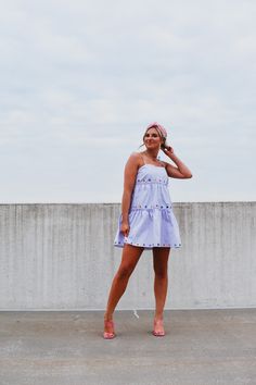 Look no further for a showstopper outfit - the Kaylie Eyelet Trim Mini Dress is a guaranteed winner! This lavender mini dress is nothing short of a party in a dress, with its fun rainbow eyelet trim. Rock the room (and turn heads) with this look that's the perfect balance of girly and glam! adjustable tie straps fully lined throughout true to size model wearing size small model stats : size small 5'5 Eyelet Mini Dresses For Day Out, Cute Purple Mini Dress For Spring, Cute Mini Dress For Night Out, Cute Mini Dress For A Night Out, Fun Summer Party Mini Dress, Cotton Eyelet Mini Dress For Summer, Purple Cotton Mini Dress For Day Out, Summer Cotton Eyelet Mini Dress, Fun Sleeveless Mini Dress For Spring