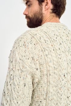 The Islands of Ireland are steeped in Irish mythology, legend and tradition that have inspired our Aran knitwear Collection. Tap into the magic of Irish tradition with our Inishbofin Traditional Aran Sweater. Made with beautiful, high quality Worsted wool, this Aran sweater is the perfect companion to keep you warm and comfortable no matter how you spend your day. You’ll notice that this Aran sweater boasts the traditional Aran honeycomb stitch. Inspired by the fishermen of the past, this stitch Mens Aran Sweater, Irish Mythology, Honeycomb Stitch, Aran Sweater, Homewares Shop, Irish Traditions, Past And Present, Yarn Shop, Easy Wear