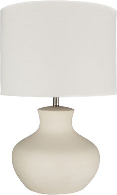 a white table lamp with a white shade on it