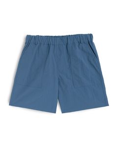 Solid blue utility shorts in ripstop nylon Blue Outdoor Shorts With Elastic Waistband, Outdoor Blue Shorts With Elastic Waistband, Blue Shorts With Elastic Waistband For Outdoor, Blue Cargo Pocket Shorts, Sporty Blue Shorts For Hiking, Sporty Blue Hiking Shorts, Blue Nylon Shorts With Side Pockets, Blue Shorts For Spring Outdoor Activities, Blue Hiking Shorts For Summer