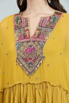 Mustard anti-fit jacket style kaftan top with intricate hand embroidered yoke and scattered buttis. Comes with coordinating sharara and solid inner slip. - Aza Fashions Top And Sharara Set, Yellow Kaftan, Embroidered Kaftan, Kaftan Top, Women Kurta, Sharara Set, Embroidered Neckline, Contemporary Outfits, Embroidered Jacket