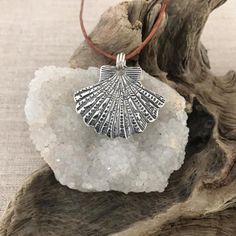 "You can find more silver treasures in my shop! Click here: https://www.etsy.com/shop/SeasideSilverJewels Or follow me on Facebook: https://www.facebook.com/SeasideSilverJewels/ The Sea Scallop is a little miracle from the sea. A beautiful treasure when found. SIZE AND DETAIL: It's about 1 1/8\" long and 1 1/2\" wide. Each pendant contains approximately 8.5 grams of fine silver. I handcraft each piece so weight may vary slightly. All my materials are recycled and/or natural. HOW IT\"S MADE: I ma Silver Shell-shaped Ocean-inspired Jewelry, Beach Pendant Jewelry With Engraving, Beach Engraved Pendant Jewelry, Silver Shell-shaped Bohemian Jewelry, Bohemian Silver Shell Jewelry, Silver Bohemian Shell Jewelry, Nickel Free Silver Jewelry For The Beach, Nickel-free Silver Jewelry For The Beach, Adjustable Silver Necklace With Ocean-inspired Style