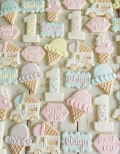 ice cream cookies are arranged on a table with the words sweet one written in frosting