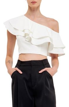 Billowy ruffles grace the one-shoulder neck of a striking crop top. One-shoulder neck Short sleeves Lined 100% polyester Hand wash, dry flat Imported Off Shoulder Ruffle Top, One Shoulder Ruffle Top, Ruffle Top Blouses, Sleeve Ideas, Sleeves Ideas, Viscose Dress, Off Shoulder Crop Top, Ruffle Sleeve Blouse, Bow Blouse