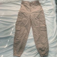 Abercrombie Pants Size Xs Tan Pockets On The Side (Cargo Style Pants) New With Tags Synched By The Ankle High Waisted Abercrombie Pants, Black Coated Jeans, Plaid Jumpsuit, Cropped Cargo Pants, Bell Sleeve Romper, Slacks Trousers, Vegan Leather Leggings, Petite Shorts, Cargo Style