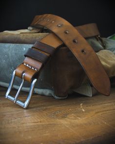 If you're looking for a classic, then look no further. Elegance and simplicity make this belt a faithful ally for every day. This brown belt won't go out of style any time soon - rock it with a pair of jeans and your favorite top or shirt. Full grain leather at 3.5-4mm thick combined with our quality workmanship will guarantee that this belt will last you a lifetime. The belt is 4cm wide. To choose the correct size, please use one of the following methods. 1) Take a tape measure and a belt you c Formal Leather Belt With Brass Buckle, Formal Bridle Leather Belt With Brass Buckle, Formal Brown Belts And Suspenders With Brass Buckle, Classic Belts With Leather Strap For Everyday Use, Business Belt With Brass Buckle In Bridle Leather, Classic Leather Strap Belts For Everyday Use, Classic Leather Strap Belt For Everyday Use, Classic Adjustable Belts And Suspenders For Everyday, Everyday Bridle Leather Belts And Suspenders With Removable Belt