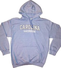 Gildan Light Blue Hoodie 8.0 oz. Heavy Blend Hooded Pullover. Double-lined hood with matching drawstring. Set-in sleeves. Double-needle throughout. 1x1 athletic rib with spandex, pouch pocket. Two color screen print on front. Original design by Girls Gotta Play. Copyright 2014 Unc Lacrosse, Lacrosse Hoodie, Light Blue Hoodie, Cute Sweatshirts, Blue Hoodie, Cute Everyday Outfits, Carolina Blue, Hooded Pullover