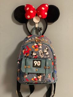 Mickey ear Head Band/Backpack Wall Display, Each Mickey Inspired Head Band Wall Display will accept a 29mm wide band and comes with 1 screw and insert . These are great way to display your Disney parks ears and backpack.Backpack and mickey ears not included in purchase this listing is only for holder If your looking for ears holders without backpack holder 2 listings are here https://www.etsy.com/listing/834946546/mickey-ear-head-band-wall-display-3d?ref=shop_home_active_15&crt=1-slim design Backpack Display, Disney Decor Bedroom, Backpack Holder, Disney Vacation Countdown, Ear Display, Backpack Wall, Mickey Mouse Purse, Loungefly Backpack, Disney World Christmas