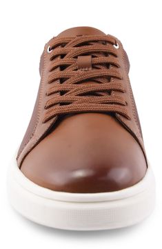 With a sleek monochromatic design, this white-sole sneaker adds casual style to a classic low-top sneaker. Synthetic upper, lining and sole Imported Brown Leather High-top Sneakers With Translucent Outsole, Modern Brown Sneakers With Translucent Outsole, Brown High-top Sneakers With Translucent Outsole, Classic Lace-up Sneakers With Translucent Outsole, Classic Lace-up Custom Sneakers With Translucent Outsole, Casual Sneakers With White Sole, Brown Low-top Slip-on Sneakers For Streetwear, Brown High-top Sneakers With Textured Sole, Casual Brown High-top Sneakers With Textured Sole