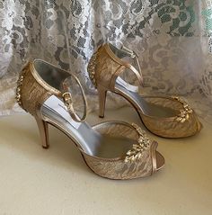 "COLORS: *CHAMPAGNE/GOLD, *Ivory/gold, *Off-white/gold, *White/Silver, *Silver/Silver, Off-white Silver.* the center adornment will be the same as the one on the video only. HEEL: 3 1/2\" inches heel US SIZES: B5, 5.5, 6, 6.5, 7, 7.5, 8, 8.5, 9, 9.5, 10, and 11. FINAL SALE! NO RETURNS, NO EXCHANGES, PLEASE CONTACT FOR ANY QUESTIONS, OR HELP YOURSELF WITH SIZING GUIDE PICTURED ABOVE. SHOES CAN NOT BE RETURNED OR EXCHANGED; I'll make all the efforts to help you have a pleasant shopping experience; Gold Open Toe Heels For Gala, Gold Open-toe Heels For Gala, Gold Open Heel Elegant Heels, Gold Open Heel Heels For Gala, Elegant Gold Wedding Shoes For Evening, Elegant Gold Low Heel Shoes, Gold Heels With 4-inch Open Heel, Gold Elegant Heels With Round Toe, Gold Round Toe Heels For Gala