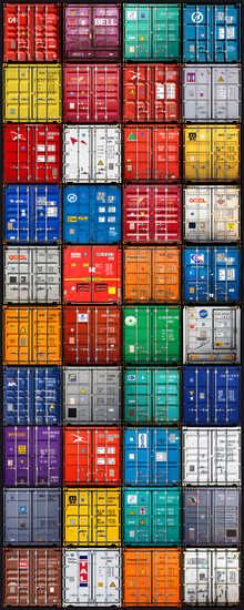 a large group of shipping containers stacked on top of each other in different colors and sizes