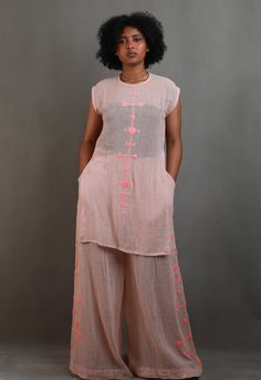 Introducing the ‘Habesha Harmony: Embroidered Women’s Top and Trouser Duo’. This set is a harmonious blend of Ethiopian tradition and Ethiopian fashion, featuring intricate Habesha embroidery that adds a touch of Ethiopian heritage to your wardrobe. The top and trouser duo is crafted from high-quality fabric, ensuring comfort without compromising on style. The embroidery, inspired by Habesha culture, adds a unique aesthetic appeal to the ensemble. Whether you’re attending a cultural event or sim Two Piece Habesha Kemis, Ethiopian Braids, Habesha Culture, Ethiopian Fashion, Ethiopian Clothing, Habesha Dress, Ethiopian Dress, Habesha Kemis, Cultural Events