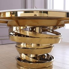 a table that has been designed to look like a spiral staircase