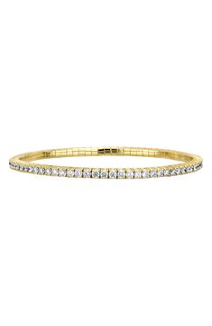 Handcrafted with a segmented design, this diamond bangle stretches for a perfect fit. 7" inner circumference Total diamond weight: 4.0ct. Color: G Clarity: VS 18k gold/diamond Made in the USA >Diamond Guide Yellow Gold Tennis Bracelet Bangle, Yellow Gold Bangle Tennis Bracelet, Elegant Yellow Gold Flexible Stretch Bracelet, Stackable Diamond Tennis Bracelet For Formal Occasions, Formal Stackable Diamond Tennis Bracelet, Flexible Yellow Gold Diamond Tennis Bracelet, Classic Flexible Diamond Bangle, Classic Diamond Bangle With Flexibility, Classic Diamond Bangle With Flexible Design