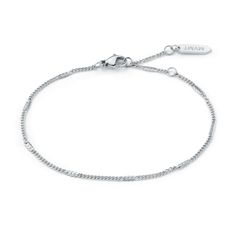 A Slim Stainless Steel Women’s Stamped Chain Bracelet. | Stamped Chain Bracelet - Womens Jewelry | MVMT Dainty Stainless Steel Jubilee Chain Bracelet, Modern Silver Chain Bracelet With Delicate Chain, Classic Adjustable Satellite Chain Bracelet, Silver Link Bracelet With Delicate Chain, Silver Satellite Chain Metal Bracelet, Silver Metal Satellite Chain Bracelet, Modern Bracelets With Satellite Chain, Elegant Silver Chain Bracelet With Satellite Chain, Silver Bracelet With Satellite Chain