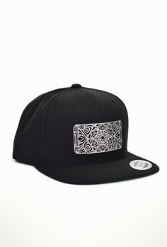 Metallic Silver Metatron's Cube Snapback Hat - Sacred Geometry Snapback - Festival Hat This black snapback hat features a large laser engraved faux leather patch with my hand drawn Metatron's Cube design. The design is engraved into black faux leather revealing a shimmery metallic silver finish. This patch is attached to the snapback with a strong waterproof fabric glue. Snapback style with a classic green under-bill. Metatron's Cube, Festival Hat, Black Snapback, Cube Design, Fabric Glue, Flower Of Life, Leather Patches, Waterproof Fabric, Sacred Geometry