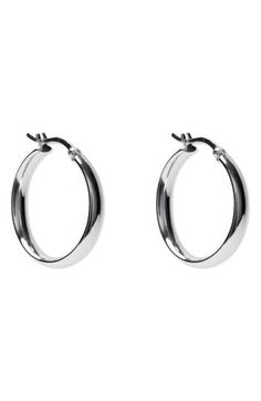 Whether made from sterling silver or sterling silver plated in 18-karat gold, these high-shine hoop earrings are the perfect accessories to take your look to the next level. 1" hoop diameter; 1/4" width Snap-post closure Sterling silver or sterling silver/18k-gold plate Imported Keep Jewelry, Silver Hoops, Silver Hoop Earrings, Christmas List, Print Gifts, Next Level, Silver Plate, Silver Earrings, Silver Plated