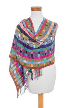 Evoking the colors of a Guatemalan festival this shawl features vibrant stripes X patterns and squares that are woven by hand from cotton yarns. Elena Ixtamer creates this shawl which is accented at the ends with dangling fringe work. Multicolor Shawl Dupatta For Summer, Multicolor Summer Shawl Dupatta, Summer Multicolor Shawl Dupatta, Summer Multicolor Shawl-style Dupatta, Bohemian Multicolor Shawl Scarves, Multicolor Woven Scarves One Size, Bohemian Multicolor Shawl Scarf, Multicolor Woven Scarf One Size, Handwoven Multicolor Scarves